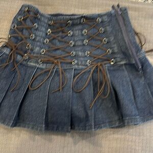 Denim mini skirt with laces, Current Mood brand size small. ￼